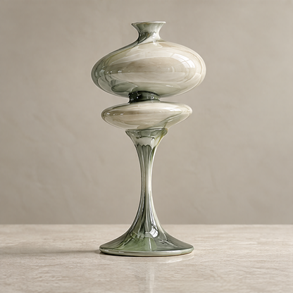 Art for Modern Spaces — double-disc vase on terrazzo ledge with dried flower stems, a timeless statement that elevates any interior